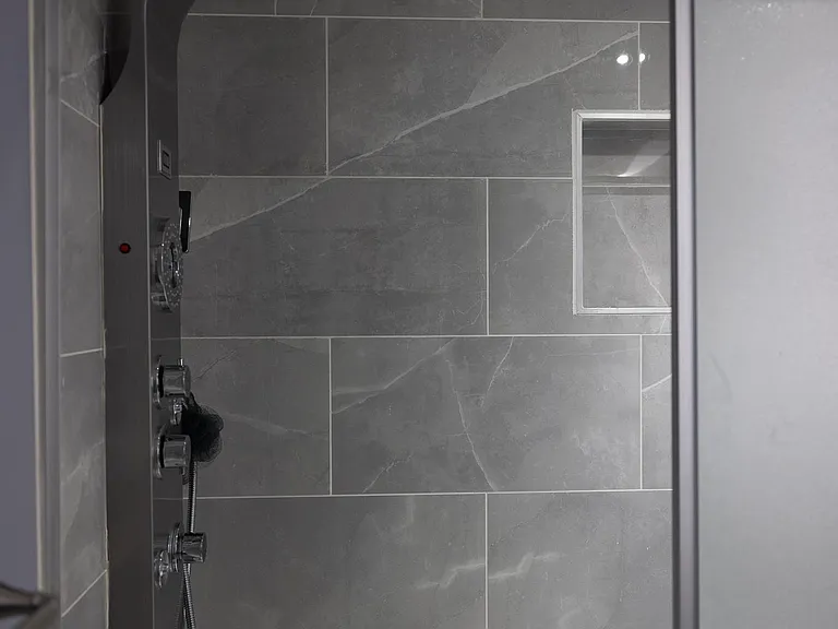 Shower tower in the basement bathroom for a spa like experience.