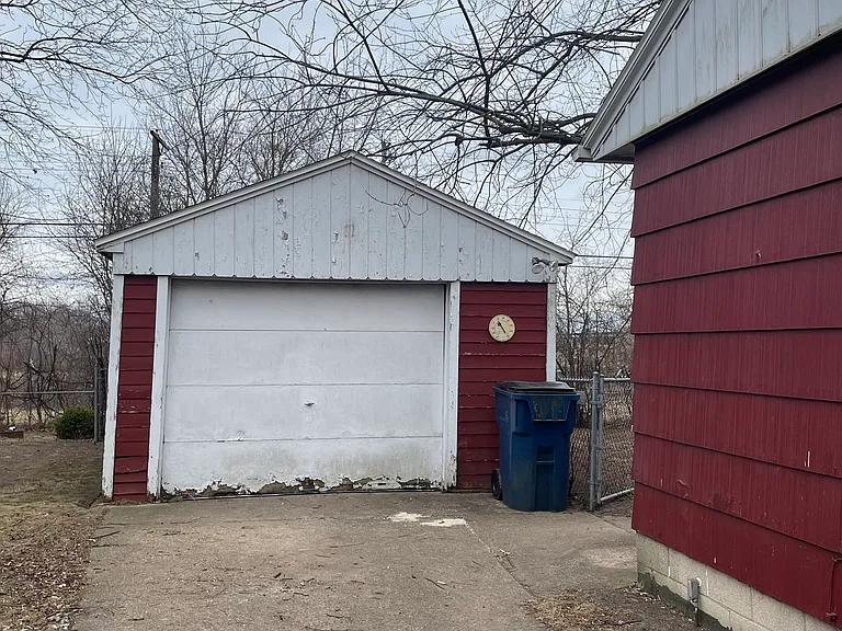 1.5 Car Garage - Will be painted in Summer!