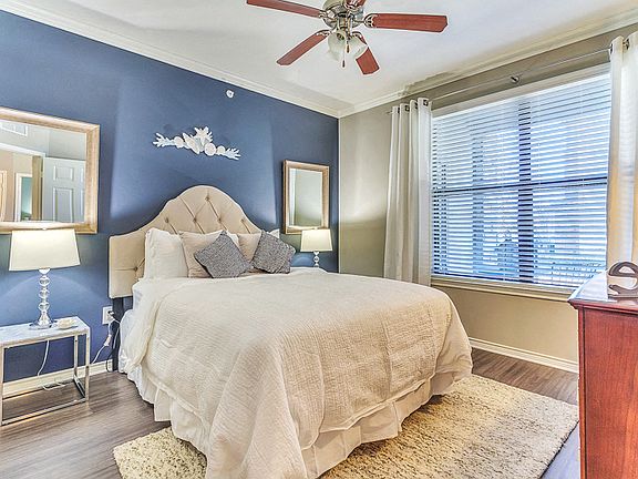 Large Master Bedroom with Lots of Natural Light and hard wood floors