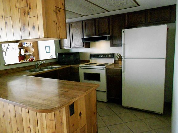 Kitchen open to LR & DR.
