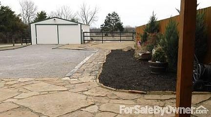 View from front porch looking at barn