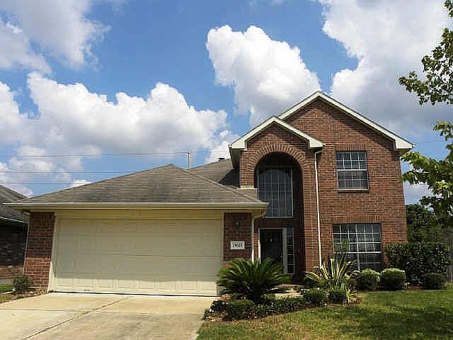 Beautifully landscaped front yard is easy to maintain