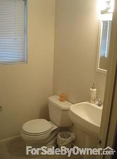 Half Bath
						:
						Powder room on main level. Tiled floor, pedestal sink. All Kohler appliances.