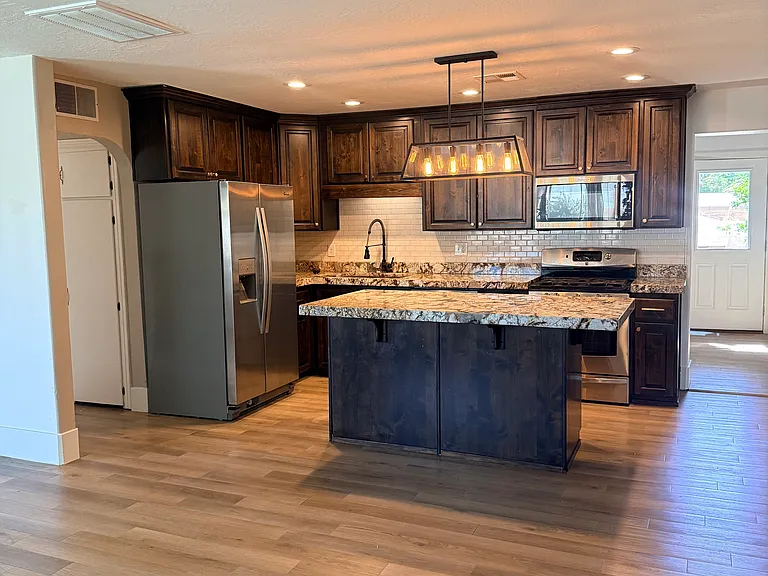 Kitchen with spacious island and open floor plan