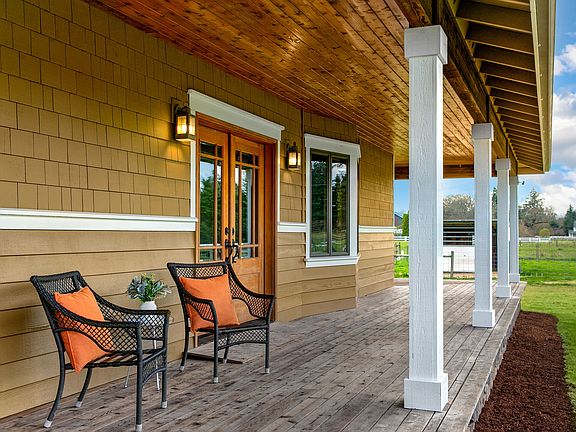 Wrap around porch goes around almost entire home by 90%