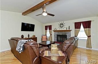 Great Room features vaulted ceiling and beautiful hardwood floors