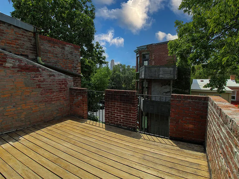 Rooftop deck with partial city views