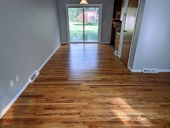 Living room looking into dining room/kitchen