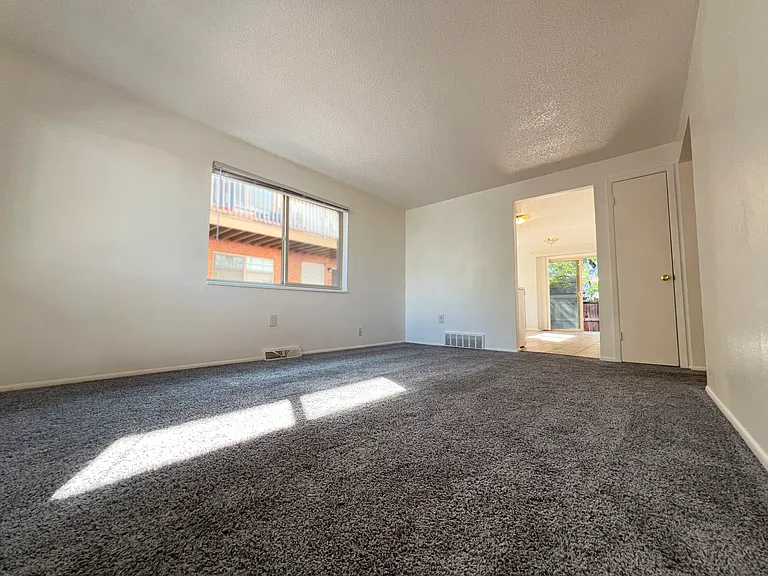 Arvada Pines Clean living room, new paint and carpet