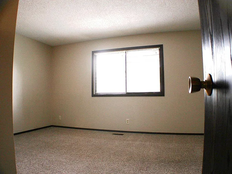 Upstairs front bedroom.