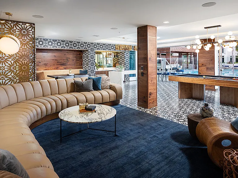 Clubroom with gaming area including billiards and expansive gathering areas