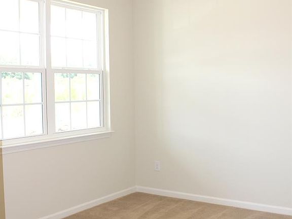 The Front Room has 2 windows facing the street. Perfect for dining room, home office, or den.