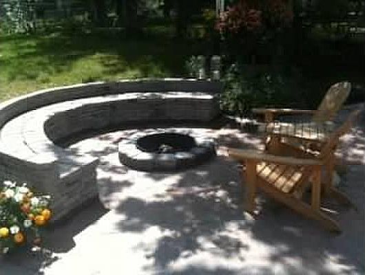 Paver bench built into stamped patio