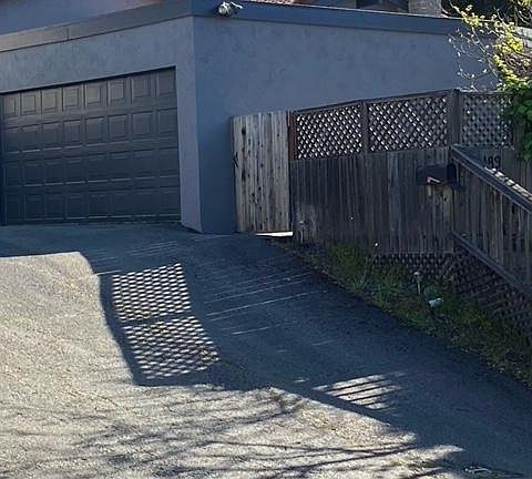 Driveway up to garage and yard entrance