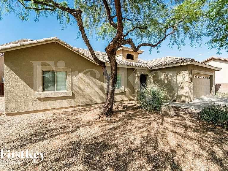 7776 W Thelon Ct — Photo 2