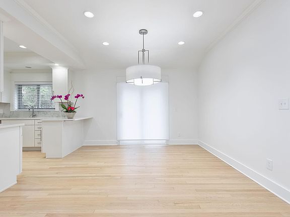 The large shade on the patio doors allows privacy when desired. When the full length shade is drawn, there's a wonderful view of the large backyard.