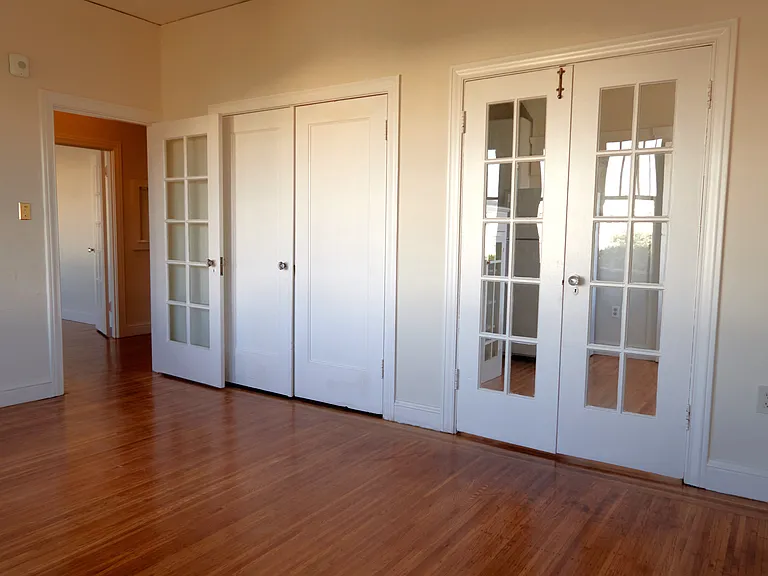 Living Room - French doors separate the kitchen and breakfast room
