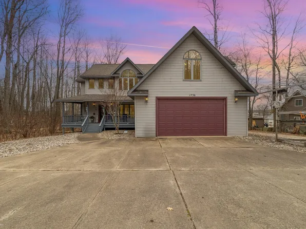 1736 W Higgins Lake Dr, Roscommon, MI 48653