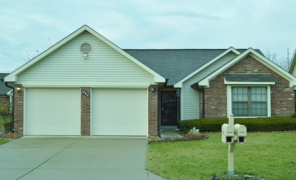 Crisp Low Maintenance Home on large corner lot with pond view. Almost 1600 square feet!