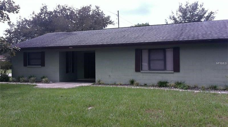Exterior Front with large covered porch.