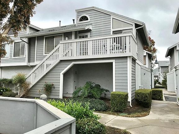 Front of condo with balcony. You have nobody above nor below you.