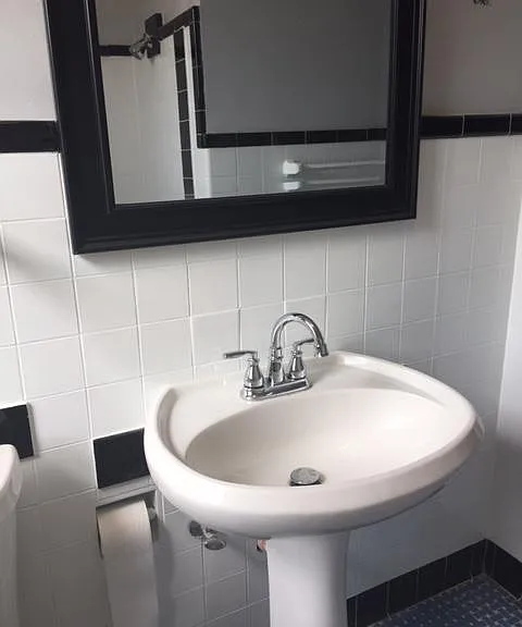 Fresh, clean bathroom, includes linen closet