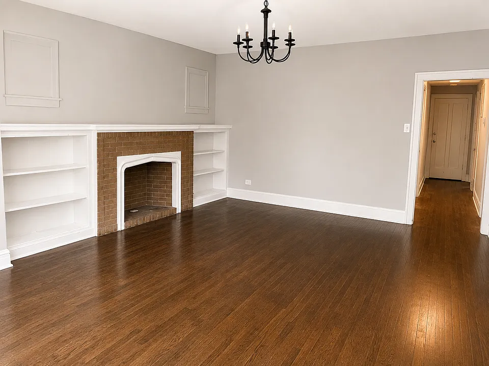 Living Room with Brick Fireplace