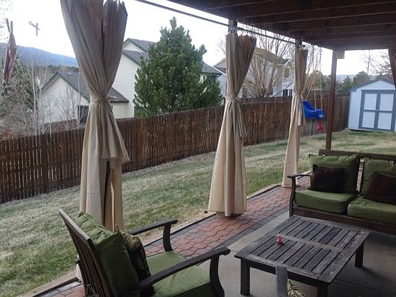 Walk-Out Patio w/ Curtains