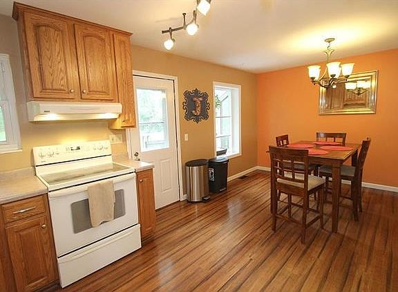 GORGEOUS BAMBOO WOOD FLOORS THROUGH OUT MOST OF MAIN FLOOR! NOTICE THE CUTE GARDEN WINDOW :)