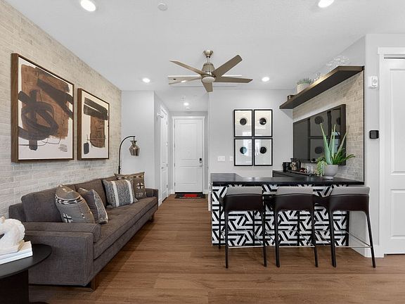 Residence 3 Entrance Living Shown with Built in Bar