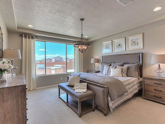 Owner s suite provides a quiet retreat with rustic decorations.