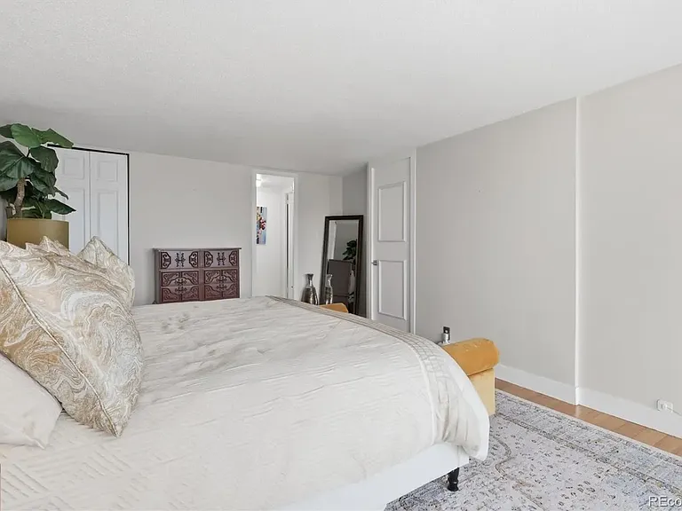 Master bedroom with 2 walk-in closets