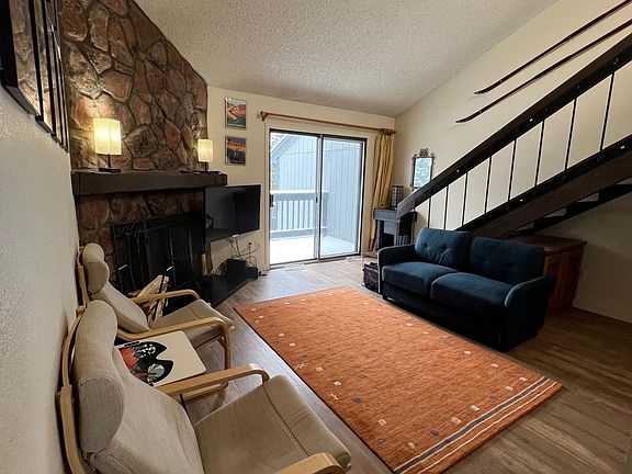 view of living room into deck and stairs