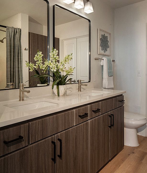 Remodeled bathrooms with luxury vinyl plank flooring