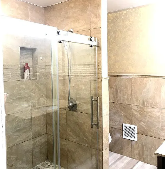 2nd floor shower. HEATED floor! Bluetooth music in the lighting. Powerful shower and borderless entry. Flooring is also waterproof "LifeProof", making it a place to fully enjoy the water.