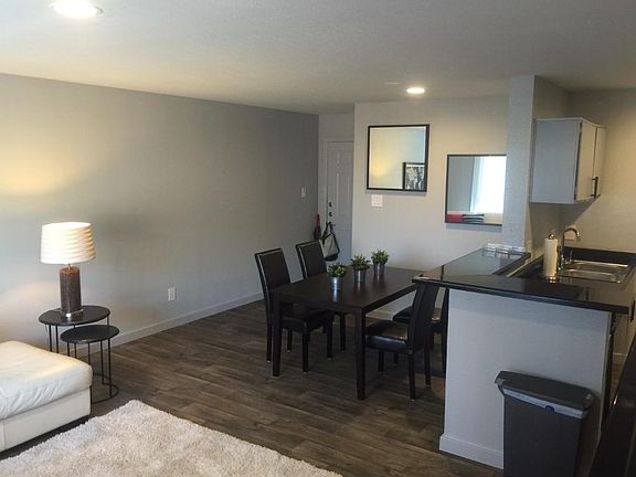 View of Dining and Entry from Living Room.