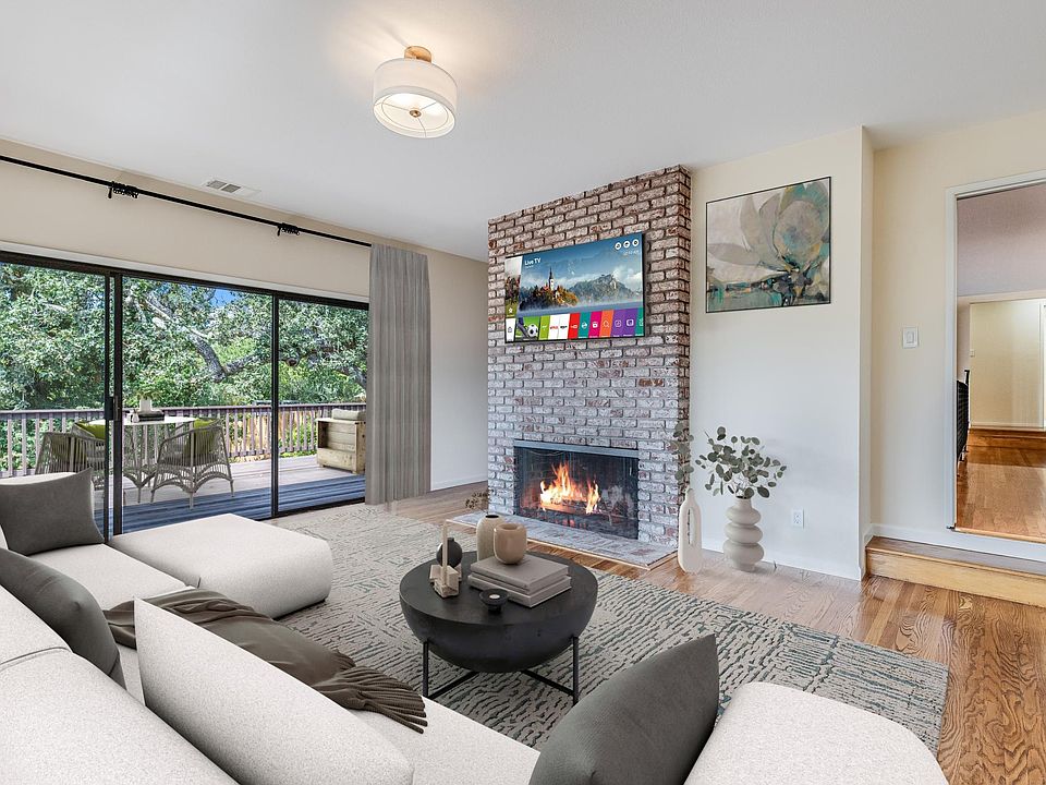 Virtually staged family room adjacent to kitchen.