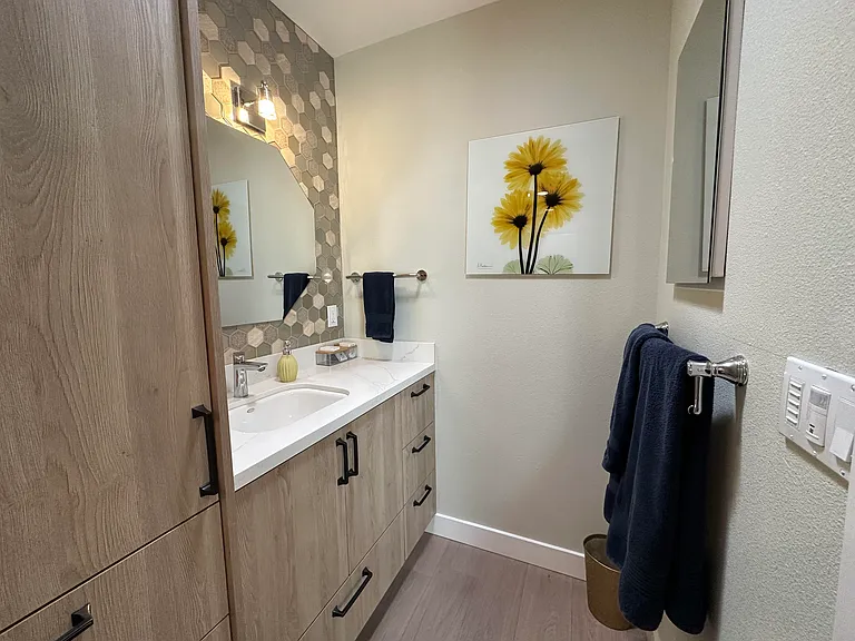 Bathroom #2 - sink and storage, toilet is to the left of the storage cabinet