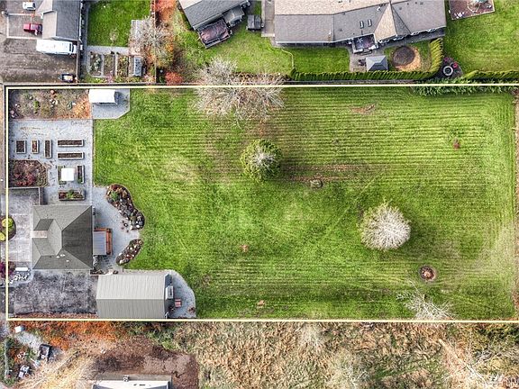 1.67 acres, fully fenced and landscaped. Room to stretch out. 