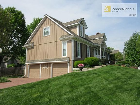 Side entry garage with pavered driveway - very classy addition.