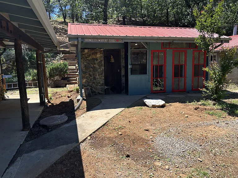 This unique bird aviary is just west of the home.
