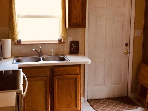 Kitchen with door to backyard