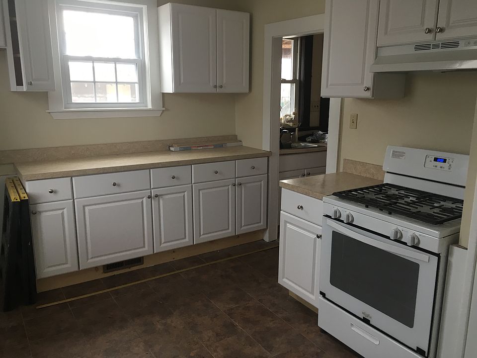 Brand new kitchen, new cabinets, stove, flooring