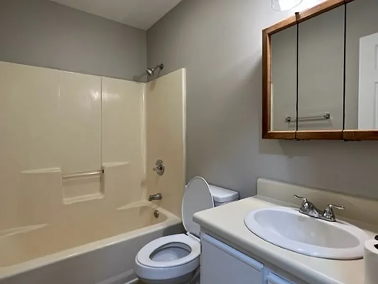 This spacious unit of a Quadplex has 2 BR and 1 Full Bath. Move In Ready! — Photo 11