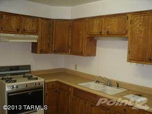 Kitchen has solid wod cabinets