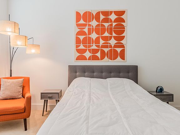 Queen sized bed with high-end gel mattress and cotton bedding