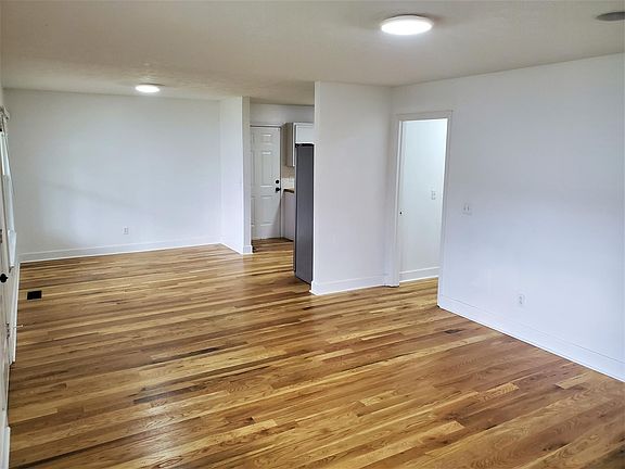 Open living, Dining, and Kitchen Area - Third Image.