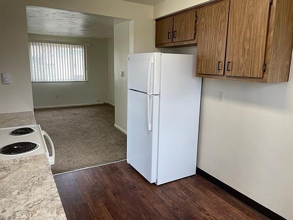 Kitchen looking into living room