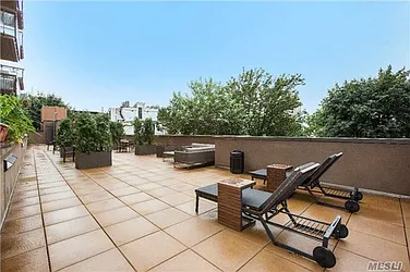 Sold by New World Realty Group LLC