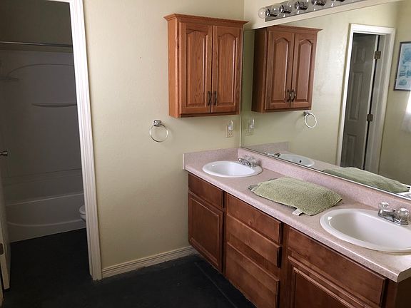 Master bathroom with dual s.